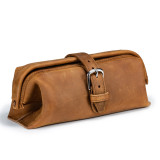 High quality tan brown leather toiletry bag from the front angle.