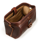 High quality dark brown leather toiletry bag from the top angled.