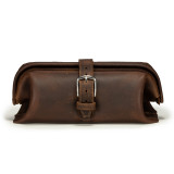 High quality dark brown leather toiletry bag from the front.