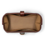 High quality dark brown leather toiletry bag from the top empty.