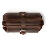 High quality red brown leather toiletry bag from the top.