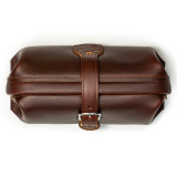 High quality dark brown leather toiletry bag from the top.