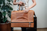 This is a lifestyle image of our tobacco compartment duffle