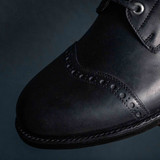 High quality broguing detail of Saddleback Leather boots in Pitch Black.