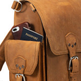 High quality light brown leather backpack with a picket behind the pocket.