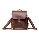 High quality red brown leather backpack from the front of the bag showing the shoulder strap.