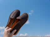 High quality lifestyle image of the barefoot slip on shoe
