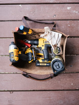 High quality lifestyle image of our range and tool leather tote in dark brown