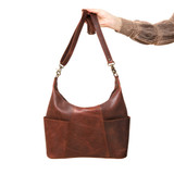 High quality womens hobo leather purse chestnt held by straps