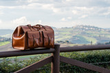 This is the lifestyle view of the Wesley Deep Pocket Duffle in  Italian Tan Leather