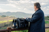High quality lifestyle view of the Wesley Deep Pocket Duffle in Italian Black Leather