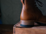 High quality back view of the Huntsman boot in natural patina