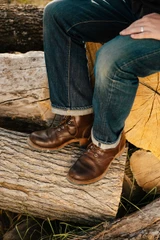 High-quality dark brown boots showing on a model