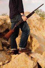 High-quality dark brown boots showing on a model