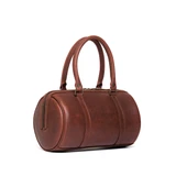 This is the side view of the everyday barrel purse in reddish brown