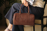 High quality lifestyle image of the everyday barrel leather purse