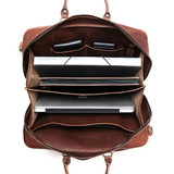 This is the product inside the filled image of the woman's business satchel in dark brown