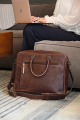 High quality lifestyle image of the women's business leather satchel in dark brown