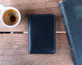 This is the lifestyle image of the passport sleeve in black