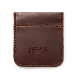 High quality front of a red brown leather coin purse used for change.