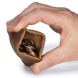High quality tan brown leather coin purse that has change inside.