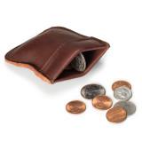 High quality red brown leather coin purse that has change spilling out in front of the pouch.