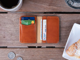 This is a lifestyle image of the Silverback Slim Bifold Wallet in Light tan