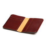 This is the open image of the Silverback Slim Bifold Wallet in reddish brown