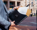 This is the lifestyle image of the document holder in black