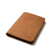 High quality side view of the Moleskine leather cover in tan