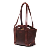High quality side image of the New Classic leather Tote in reddish brown