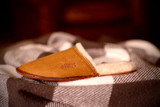 High quality tan full grain leather Dave's Deals Women's Sheepskin Slippers - Old Design - Size 12 - Tobacco detail view - Saddleback Leather