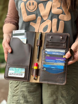 High quality lifestyle image of the Big leather Wallet in dark brown