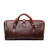 High quality back view of the reddish brown leather range and tool bag