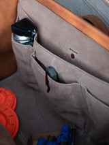 High quality lifestyle view of the leather range and tool bag