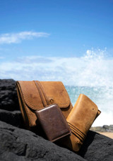 High quality the cash and receipt leather bag again with a wallet and organizer bag next to it. Made by Saddleback