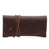 High quality red brown leather wallet bag with a wrap around it to close it from the front.