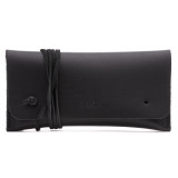 High quality black leather wallet bag with a wrap around it to close it from the front.