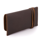 High quality dark brown leather wallet bag with a wrap around it to close it from the back.