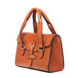 High quality side view of the Silverback Double Handle leather Purse in light tan