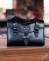 lifestyle image of the silverback handle purse