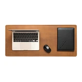 High quality lifestyle image of Long desk pad in light brown