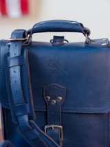 The blue shoulder pad on the bag