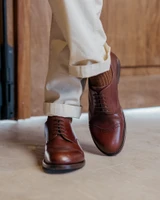 High quality dark oak full grain leather toe cap shoes front standing view with brown ribbed socks - Saddleback Leather