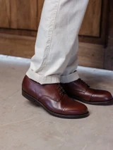 High quality dark oak full grain leather toe cap shoes low angle side profile lifestyle shot - Saddleback Leather