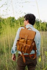 High quality front pocket backpack in light brown with model