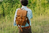 High quality front pocket backpack in light brown with model