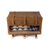 High quality leather trunk that will be a vintage antique one day in a museum. This is the front door of it that is open straight on. It is a tan brown steamer trunk that was old time luggage back in the day on trains and ships.