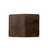 High quality outside of the dark brown slim leather passport wallet. Made by Saddleback