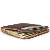 High quality tan brown leather wallet laying down flat.